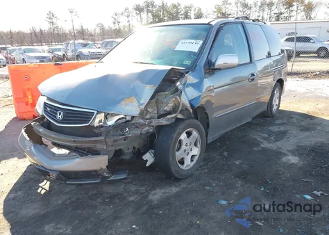 2001 Honda Odyssey Ex z USA, uszkodzony, nr VIN 2HKRL18601H558416